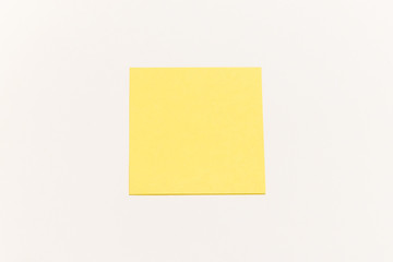 One empty yellow sticker on white background with place for text