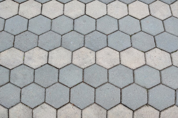 Large gray paving slabs close up. background