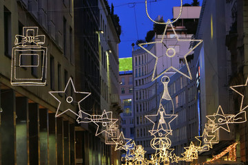 christmas lights in milan city in italy by night