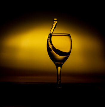 Elegant water slpash in a golden light