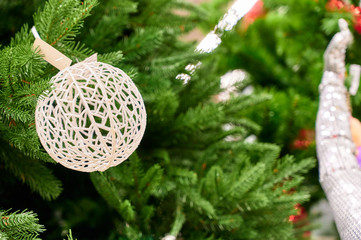 Photo of christmas tree decoration for new year and christmas. Bright lights and colors, festive mood. The concept of a happy meeting of Christmas and New Year.