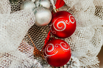 Festive decoration with red and silver balls.	