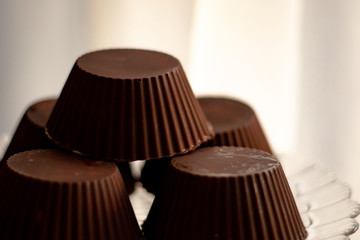 Chocolate curd cheese cake. Cake-shaped cottage cheese curds with a refined chocolate coating....