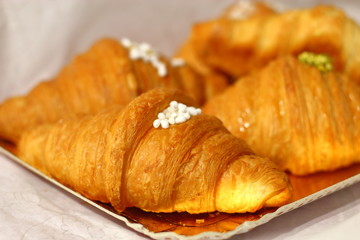 Croissants close-up, tasty, juicy, mouth-watering.