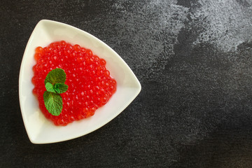 red caviar (seafood, salmon caviar) menu concept. food background. top view. copy space