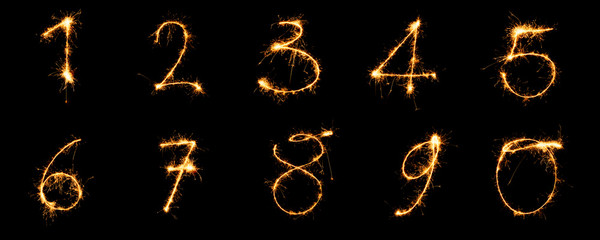 Numbers from 1 to 9 written with sparklers