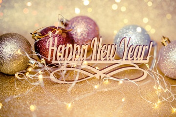 Happy New Year on a gold shiny background