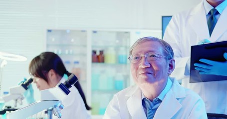 scientist team press virtual button - Powered by Adobe