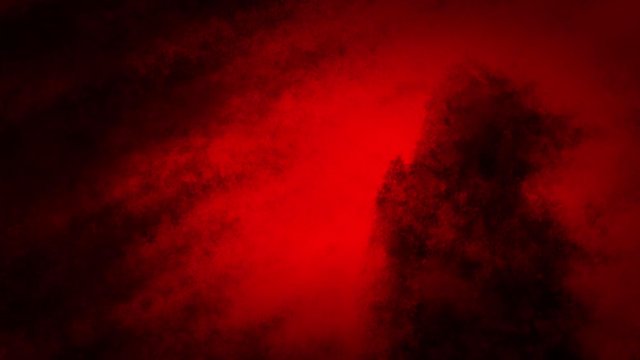 Shadow monk in light of darkness. 2D animation in horror fantasy genre. Creepy animated backdrop movie. VJ loops and music clips. Red video with coal and noise effect. Scary demon silhouette in hood. 