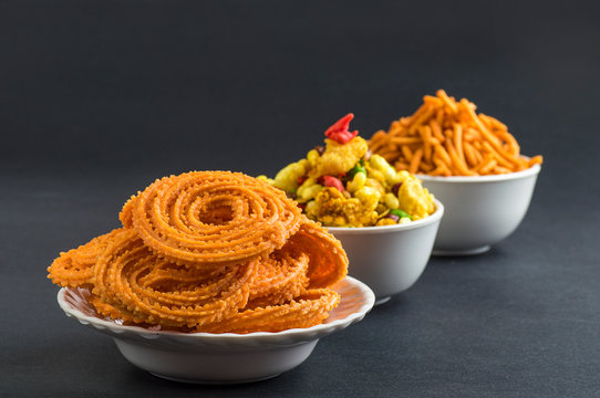 Indian Snack : Chakli, chakali or Murukku and Besan (Gram flour) Sev and chivada or chiwada. Diwali Food