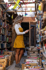 Obraz premium girl and book flea market