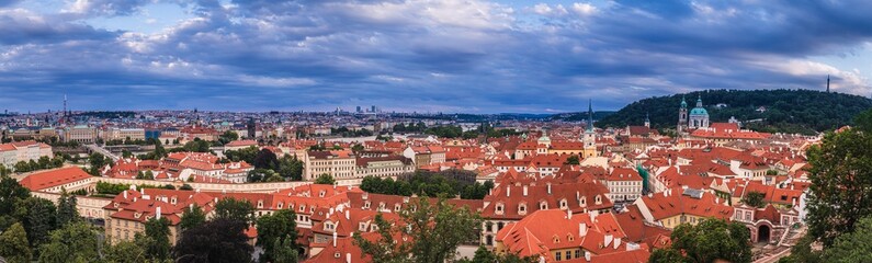 View of Prague from the observation deck near the walls of Prague Castle. View of the red roofs of Prague. Czech Republic