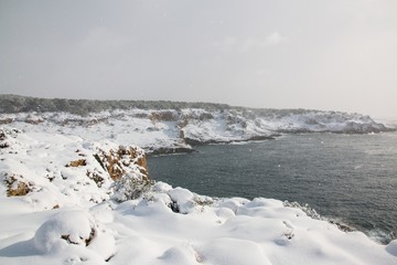 Ionian coast after a exceptional snowfall, Salento, Italy