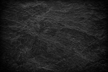 Dark grey black slate background or texture.