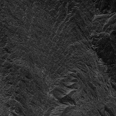 Dark grey black slate background or texture. black stone