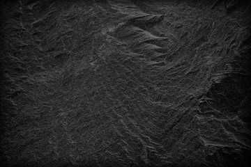 Dark grey black slate background or texture. black stone