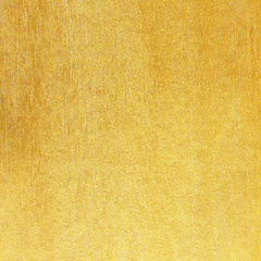 Fototapeta premium Shiny yellow leaf gold foil texture background