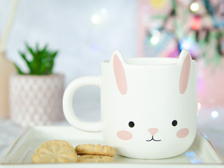 cup of tea with cookies on a background