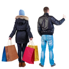 back view of couple with shopping bags