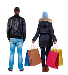 back view of couple with shopping bags
