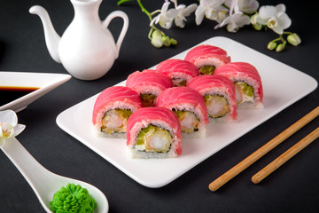 Tuna Sushi Roll with eel, cream cheese Philadelphia and avocado Sushi menu. Japanese food. 