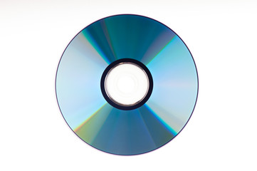 Multicoloured back side of a CD or DVD isolated on a white background.