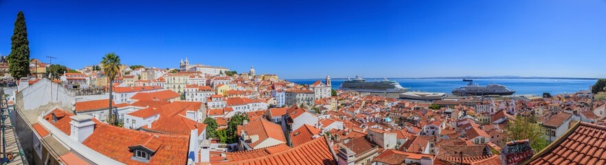 Naklejka na ściany i meble Panoramic view on cruise terminal of Lisbon with church of São Vicente of Fora in summer
