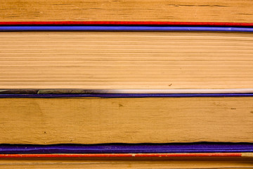 Stack of the different old books for background