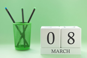 Desk calendar of two cubes for March 8