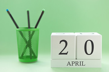 Desk calendar of two cubes for April 20