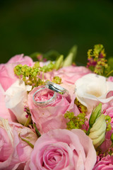 wedding bouquet with roses and rings