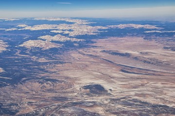 Colorado Rocky Mountains Aerial panoramic views from airplane of abstract Landscapes, peaks, canyons and rural cities in southwest Colorado and Utah. United States of America. USA.