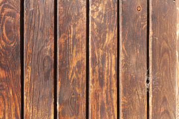Detail of old wood wall with screws and nails Painted brown, Cádiz Spain