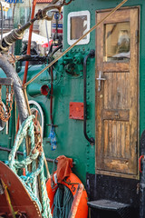 Details of old fishing boat in port of Leba town over Baltic Sea coast in Poland