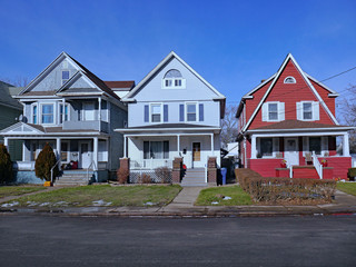 Street of older detached houses with gables