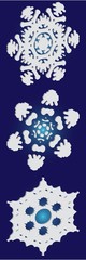 Collection of cute snowflakes on blue background.