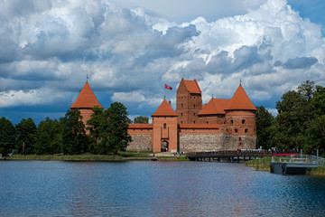 View of medieval castle in Trakai Troki before thunderstorm.