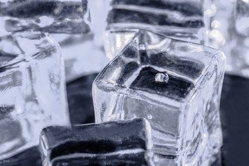 Ice cube. Close up transparent light ice cubes. Macro horizontal photography