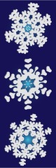 Set of isolated falling snowflakes on blue background.