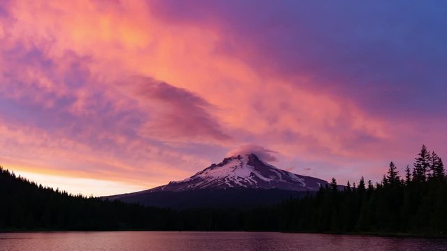 Time Lapse of Beautiful Landscape View of Mt Hood during a dramatic cloudy sunset. Taken from Trillium Lake, Mt. Hood National Forest, Oregon, United States of America.