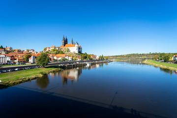 Fototapeta na wymiar View on the Albrechtsburg castle and the Gothic Meissen Cathedral, the embankment and Elbe river on the foreground.