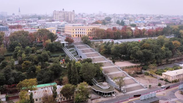 Wide birds eye view of Potemkin Stairs Odessa Ukraine with City Center behind 4K
