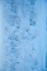 background: ice cascade, waterfall, formed by the low winter temperatures used to climb on ice