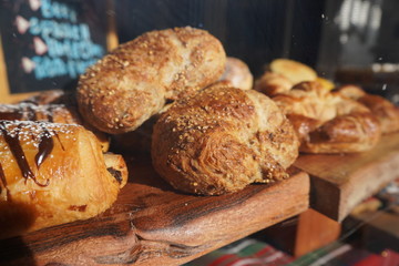 bread in a basket with sesame 