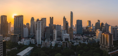 sunset rooftop view skyline panoramic twilight, office buildings, living, condominium in bangkok city skyline top view Downtown and business office bank financial in capital city of thailand asian	