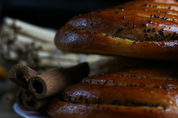 fresh delicious pastries in a beam of light on a dark background