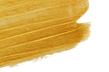 Golden paint brush stroke isolated on white background. Yellow shiny  metallic border