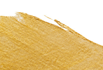 Gold paint brush stroke isolated on white background. Yellow shiny  metallic border