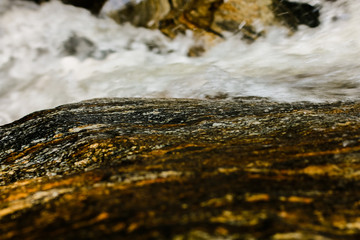 water flowing on rocks