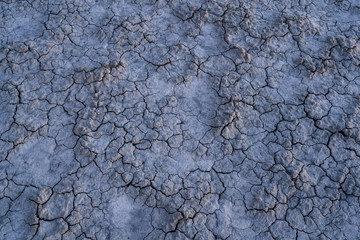 Moody blue cracked mud